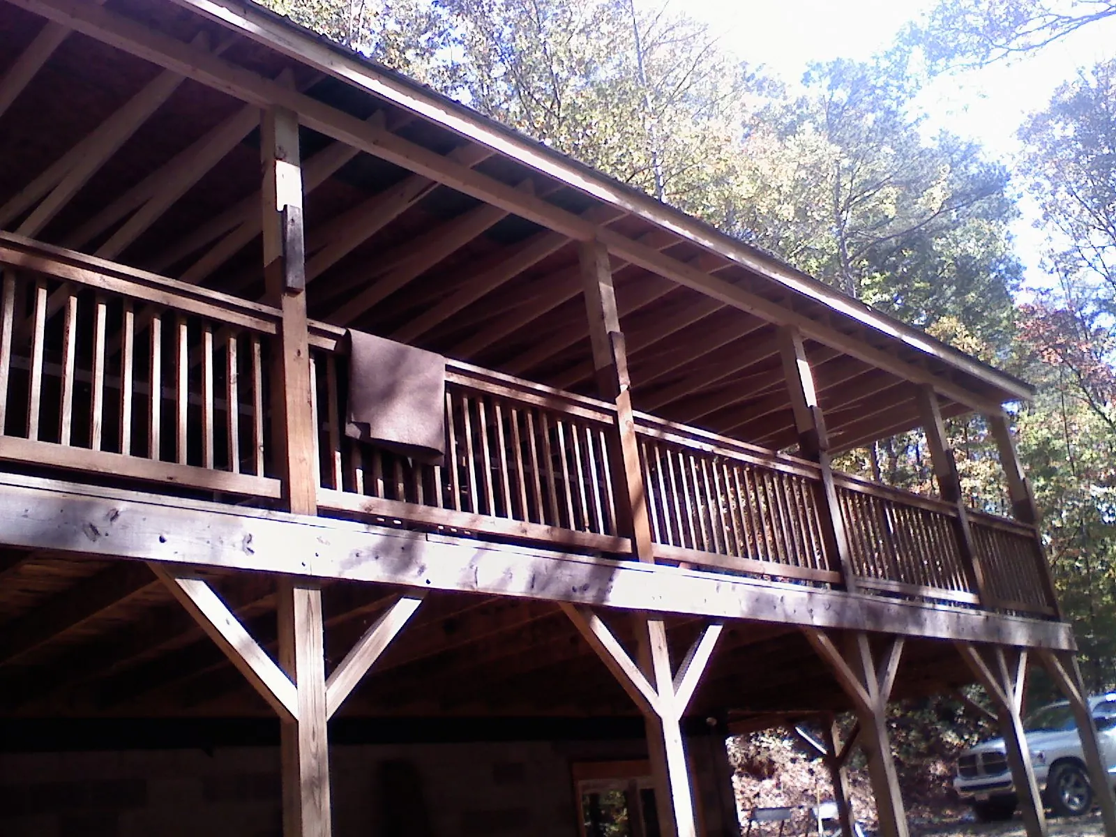Timber framing under a new elevated porch and deck — Roof Leak Repair in Sturbridge by Roofing Brothers
